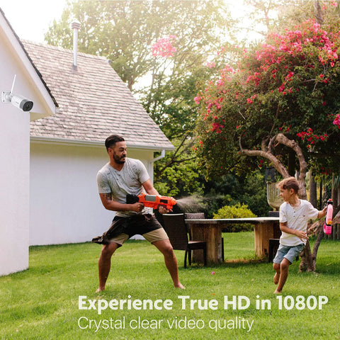 Outdoor WiFi Security Cam 1080p with Night Vision and Motion Detection on house wall, father and son playing outside