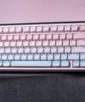Cute Bubble Cat Wireless Mechanical Keyboard Hits Different With Creamy 75 Percent Layout Hot Swappable Switches Cat Ear Shine Through Keycaps close-up with pastel colors and floral backdrop.