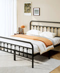 Queen Size Metal Bed Frame With Chic Victorian Headboard And Footboard Built Tough Like A Tank Skip The Box Spring Hassle Free Setup Plenty Of Under Bed Storage Black in a well-decorated room.