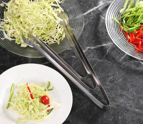 Restaurant Grade 6.5 Inch Pom Tong Set Of 6 Stainless Steel Garnish Tongs with satin finish used for serving salad on table