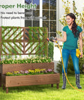 Raised Garden Bed With Trellis And Two Planter Boxes 2 Tier Outdoor Wooden Elevated Planter Box With Legs And Drainage Holes Built To Last From Durable Fir Wood For Flowers Herbs Vegetables And Fruits Brown with woman watering plants