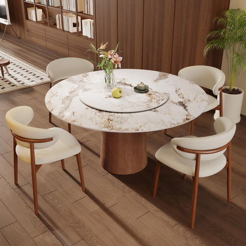 53 Inch Round Dining Table With Smooth Rotating Lazy Susan And Solid Hourglass Base Delivers A Clean Marble Look Top Crafted For Relaxed Weekend Hangouts Seats 6 To 8 In Brown with white chairs and flowers.
