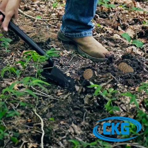 Heavy Duty Metal Detecting Shovel With Double Serrated Blade For Treasure Hunting And Root Cutting T Handle Spade in use outdoors.