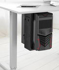 Close-up of adjustable under desk computer mount with black CPU holder, highlighting neat workspace vibes and stability.