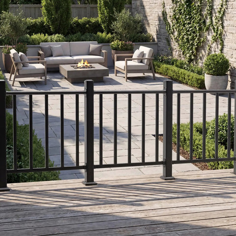 Heavy Duty Modular Deck Railing Kit, 36 By 3 Foot Black Porch Rails With Single Post, overlooking a patio with fire pit.