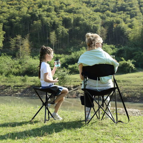 Two people sitting by a lake on Extra Large Quick Folding Tripod Stool With Backrest For Fishing And Camping Built Tough Beefy Portable Chair