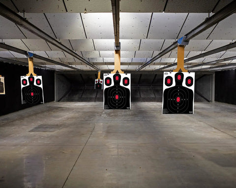 Silhouette Shooting Target Bulk Pack of 50 in Black 18 by 24 Inches with Multiple Aiming Zones at Indoor Shooting Range