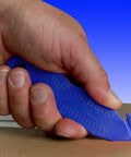 Stainless Steel Package Opener Safety Utility Cutter Five Pack Assorted Colors For Home Office And Garage One Hand Easy Box Cutter With Curved Blade For Safer Faster Seal Opening And Durable Everyday Use, blue opener in hand cutting a box seam