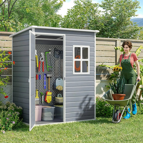 5x3 Ft Outdoor Storage Shed With Lockable Door, Rugged Weatherproof Resin Garden Shed With Floor And Ventilation shown with tools and potted plants