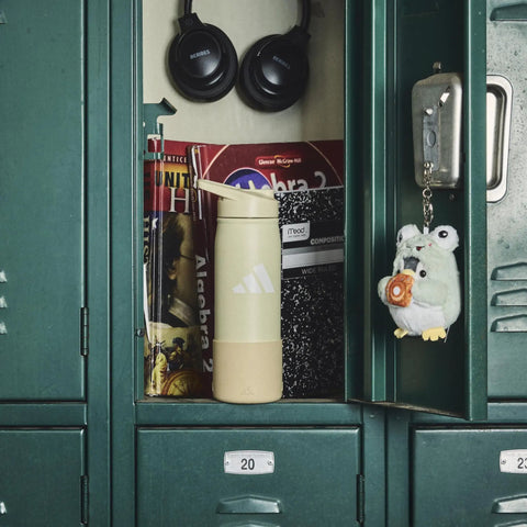 Double Wall Vacuum Insulated Metal Water Bottle With Secure Straw Lid Keeps Drinks Ice Cold Through The Daily Grind And On The Go Hustles For Gym Goers And Office Crews in school locker.