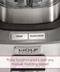 Close-up of Wolf Gourmet blender controls, featuring pulse and start/stop buttons on stainless steel base; 32 Oz Blender Jar For Wolf Gourmet High Performance Blenders WGBL100S WGBL110S WGBL120S WGBL200S WGBL134S Compact Size For Dressings Dips Sauces And Smoothies Includes Emulsion Cup And Filler Cap.