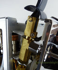 Close-up of mechanics inside Oscar Direct Connect Version Black Espresso Machine With Copper Boiler For 110V Power Compact 32 Cm Wide.