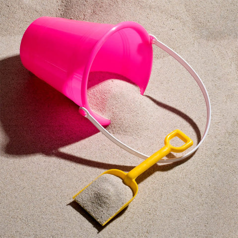 Pink bucket and yellow shovel on sand, from 12 Pack Kids Beach Buckets And Shovels Set Five Point Five Inch Small Sand Toys