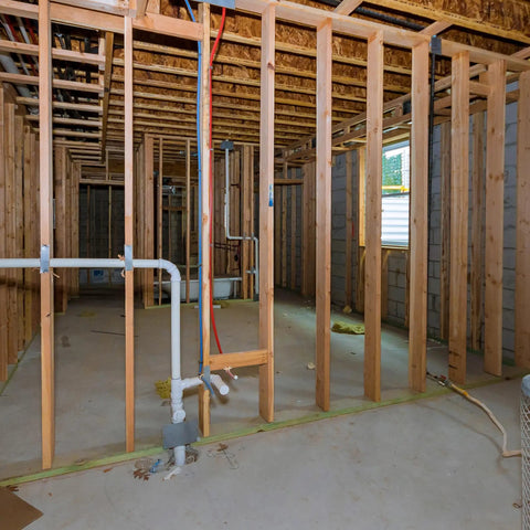 Unfinished basement with wooden beams, showcasing use for Beefy Basement Floor Jack 19 To 36 Inch Adjustable Support Beam Post.