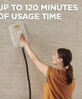 Person using Chemical Free Wallpaper Steamer For Easy Peasy Removal, No Harsh Chemicals, Dual Steam Plates Included.