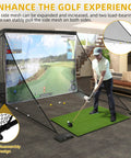 Man practicing on 10x7ft Golf Hitting Net With Side Net And Simulator Cloth Portable Steel Frame Golf Cage in indoor setup.