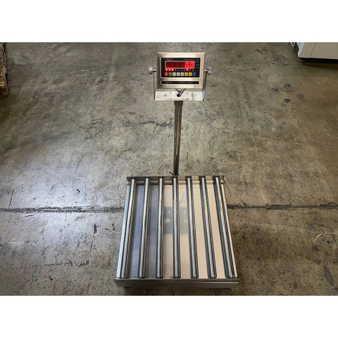 Heavy Duty Roller Top Bench Scale 18 X 18 Inches 500 Lb Capacity NTEP Legal Digital Platform with rollers on a concrete floor.