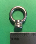 Close-up of 1/4 inch marine grade stainless steel lifting eye nut with ruler, AISI 316 corrosion resistant heavy duty eyebolt.