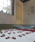 One Eighth Inch T Lock Tile Leveling Kit with 300 Spacers and 100 Wedges in use on large-format tile floor installation
