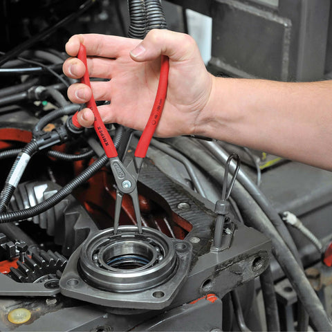 Knipex Internal Precision Snap Ring Pliers Go To Pro Grade Tool For Internal Circles held by hand installing snap ring