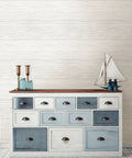 White shiplap peel and stick wallpaper behind a multi-colored drawer unit, Shiplap Peel And Stick Wallpaper White And Off White Removable Easy DIY Wall Decor For Rentals And Home Refresh No Residue Easy To Remove And Repositionable For Accent Walls And Renter Friendly Updates Across Living Areas