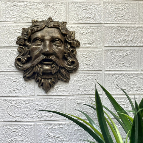 Top Tier Green Man Wall Decor, Slick 9.75 Inch Heavy Duty Cast Iron Plaque, Solid Bronze Finish, wall-mounted decoration with foliage.