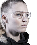 Woman wearing Clear Lens Safety Glasses with Side Shields Anti Fog Anti Scratch Anti Glare UV Protection Protective Eyewear