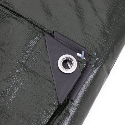 Close-up of eyelet on Heavy-Duty 12x14 Foot Poly Tarp With Reversible 8-Mil Waterproof Coverage For Multi-Use Outdoor, Construction, Camping and more, UV Guard, Built Tough Green And Silver Weatherproof Shield For Gear And Projects.