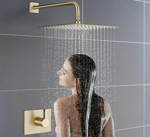 Woman enjoying Brushed Gold Shower Fixtures Set With 12 Inch Square Rain Shower Head, Tub Spout, 16 Inch Shower Arm, Valve Included