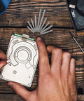Watch Band Pins Replacement Kit With Metal Spring Bars And Screws For Easy Watch Repair on wooden surface.