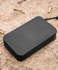DAKA Utility Organizer Compact SemiRigid Case For Gear And Electronics Weather Resistant Heavy Duty Pouch in black on sand