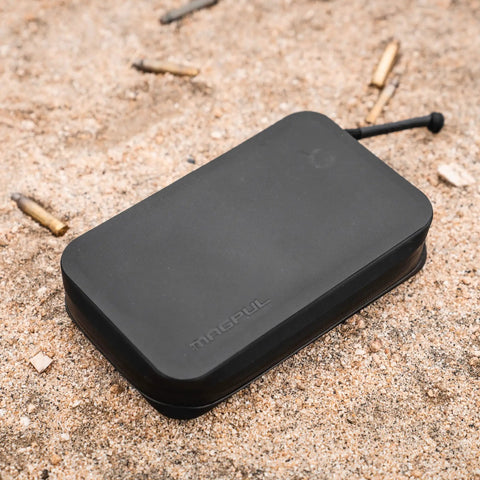 DAKA Utility Organizer Compact SemiRigid Case For Gear And Electronics Weather Resistant Heavy Duty Pouch in black on sand