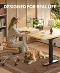 Adjustable Height Solid Bamboo Standing Desk 60 By 30 Inches With Sturdy Black Steel Frame in a home office setting.
