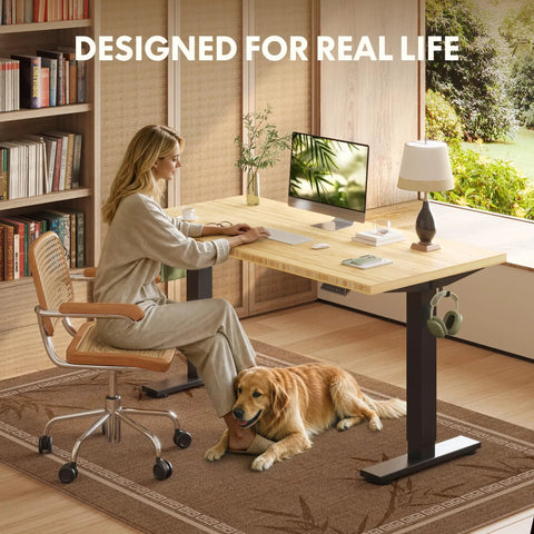Adjustable Height Solid Bamboo Standing Desk 60 By 30 Inches With Sturdy Black Steel Frame in a home office setting.