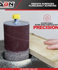 Person using Aluminum Oxide Spindle Sanding Sleeves 18 Pack 4.5 Inch Length Assorted Grits 80 120 240 to smooth wood on a sander.