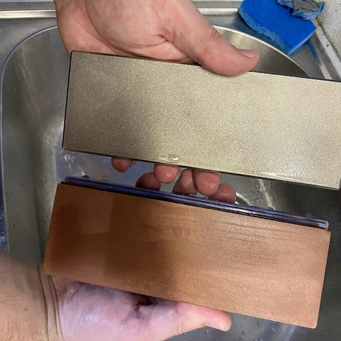 Hands holding Diamond Lapping Plate 220 Grit for Flattening Waterstones and Sharpening Blades Ultra Flat to Under 0.0005 Inches Made in USA