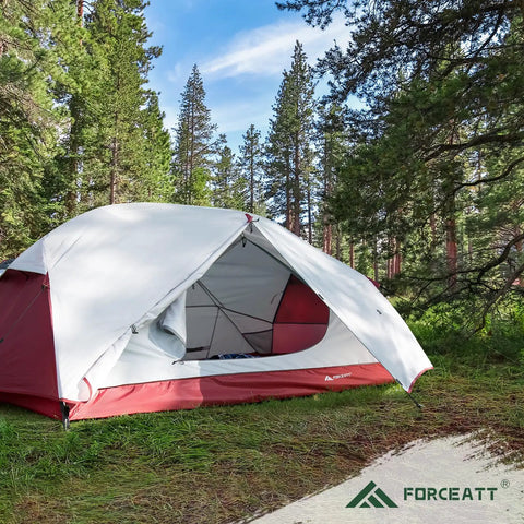 Two Person Waterproof And Windproof Camping Tent in forest setting, showing aluminum poles and open dual D-shaped doors