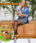 Acacia Wood Deck Box Bench 47 Gallon Outdoor Storage Chest With Seating, woman sitting, showing storage and natural finish.