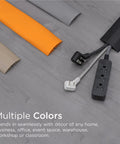 6Ft Floor Cord Cover Cable Protector in tan, orange, grey, black on floor with power strip, ideal for HDMI Cables Power Strips Wires