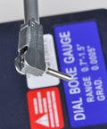 Close-up of Fowler 52-646-100-0 dial bore gauge set with 0.7–1.5 in range and metal probe.