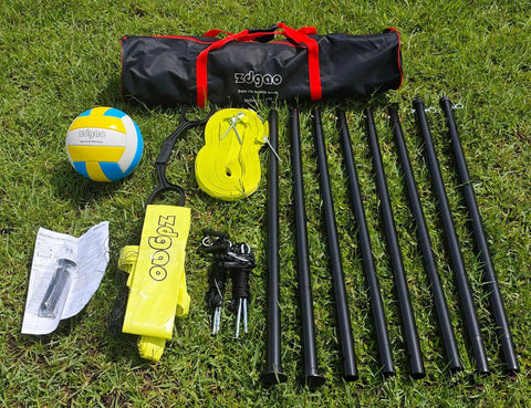 Backyard Ballin Portable Volleyball Set With Pro Net Wrap Yarn Volleyball And Pump components on grass
