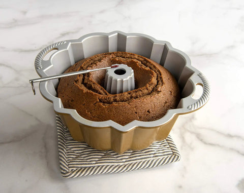 Bundt cake with Reusable Bundt Cake Thermometer That Turns Red When Doneness Is Reached, Perfect For Center Of The Cake Testing.