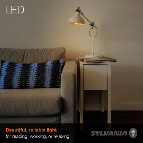 Living room lamp lit with LED B10 Light Bulb 300 Lumens 2700K Soft White Non Dimmable 4.5W Clear Glass in cozy setting