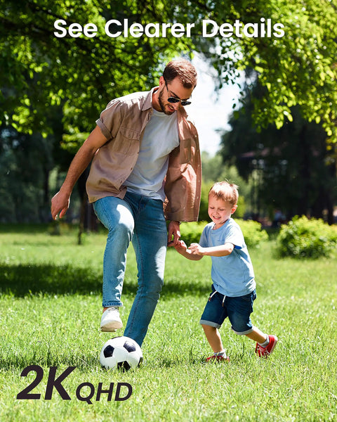 Man and child playing soccer in the park, highlighting 2K QHD quality with clear details.