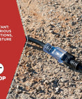 Beefy 50 Foot Generator Extension Cord With 10 Gauge 3 Conductors, Lighted Ends, shown outdoors on gravel surface.