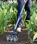 Rotary Cultivator Garden Tool With Long Handle For Easy Clod Breaking And Seedbed Prep Adjustable Hand Tiller Manual Soil Crusher in use