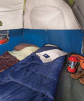 Interior view of Easy Setup Sundome Camping Tent With Rainfly Weatherproof Shelter For 2 To 6 People, showing sleeping bags and gear.