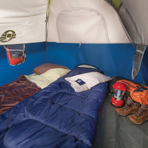 Interior view of Easy Setup Sundome Camping Tent With Rainfly Weatherproof Shelter For 2 To 6 People, showing sleeping bags and gear.