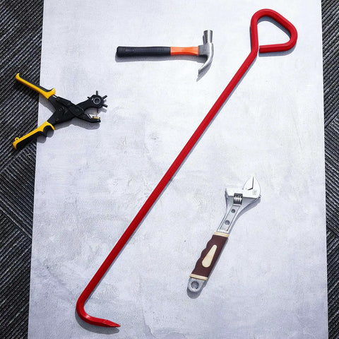 36 Inch Manhole Cover Hook Set Of 4 With 5/8 Hex Drive Handle nearby tools including hammer, wrench, and pliers on gray surface.