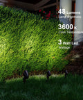 Low Voltage Landscape Lighting Floodlight And Spotlight Kit 3W LED 3600K Warm White 8 Pack illuminating hedge at night